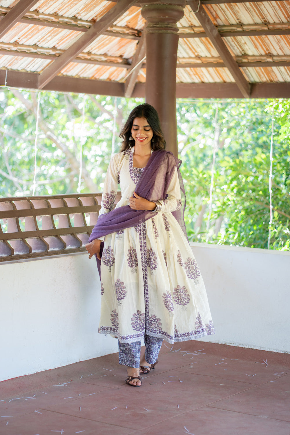 Suganya off-white handblock cotton anarkali suit set with purple dupatta - front view