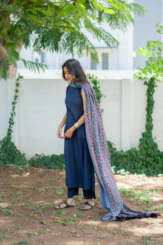 Tiksha navy blue suit set with ajrakh dupatta draped over one shoulder