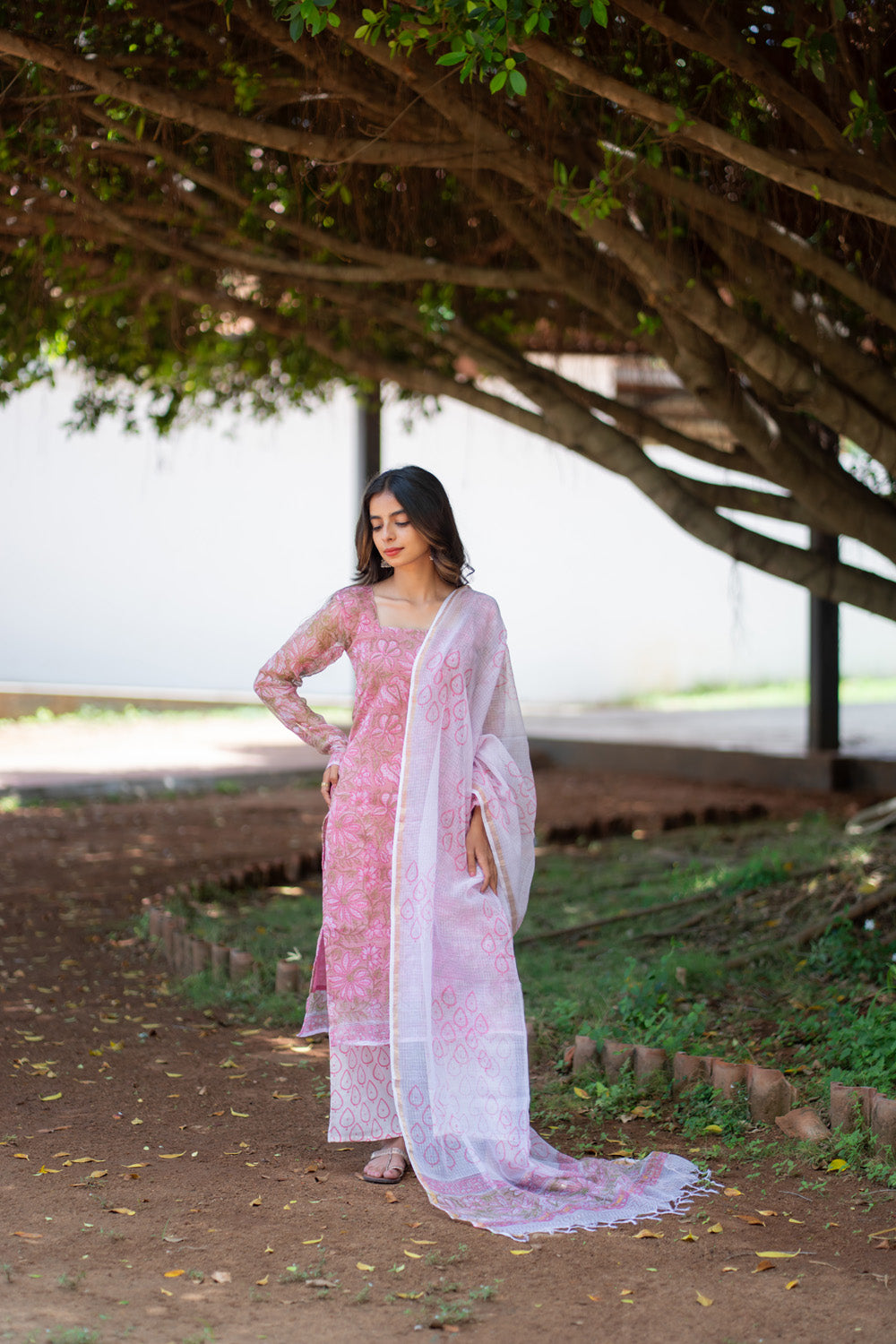 Rukmini pink straight-cut kurti with white printed pant and dupatta